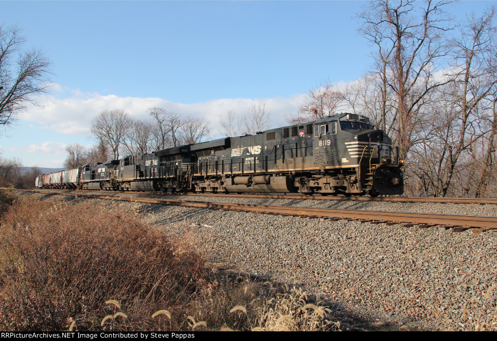 NS 8119 leads a train through Cove PA, MP 116